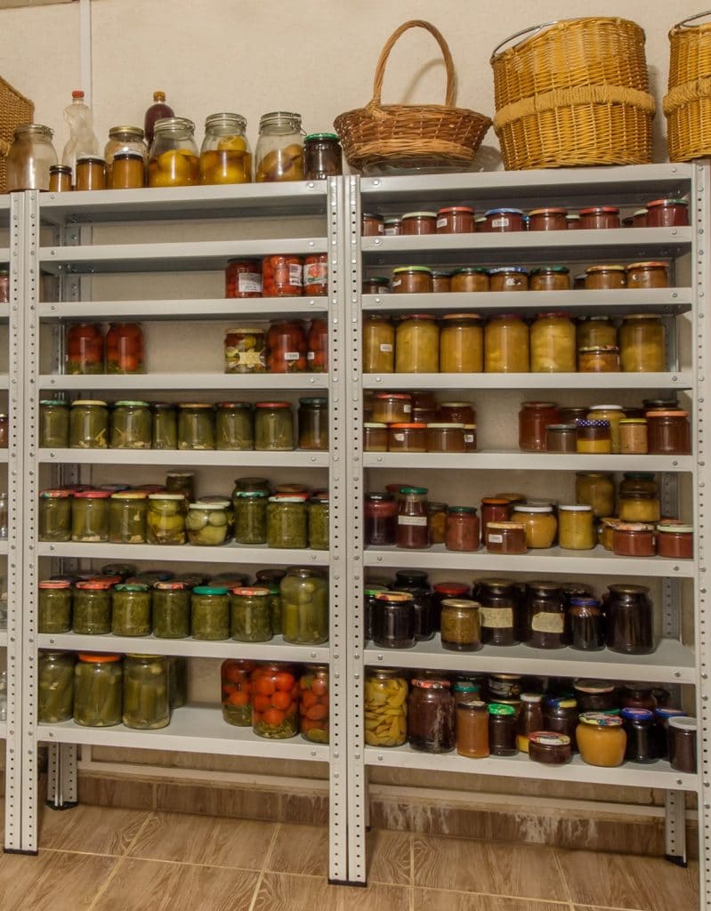 Pantry shelves full of canned food