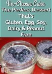 A blueberry cheesecake in a small mason jar