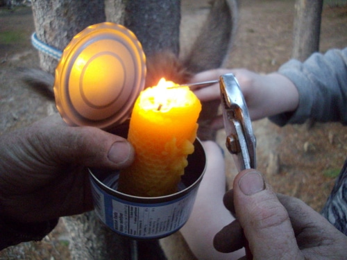Heating a needle with a flame