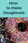 A chocolate glazed doughnut with colorful sprinkles