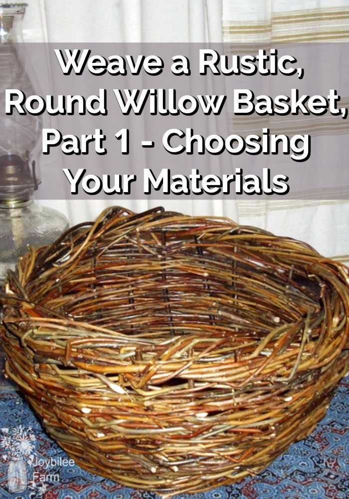 Hand woven willow basket sitting on a table beside an oil lamp