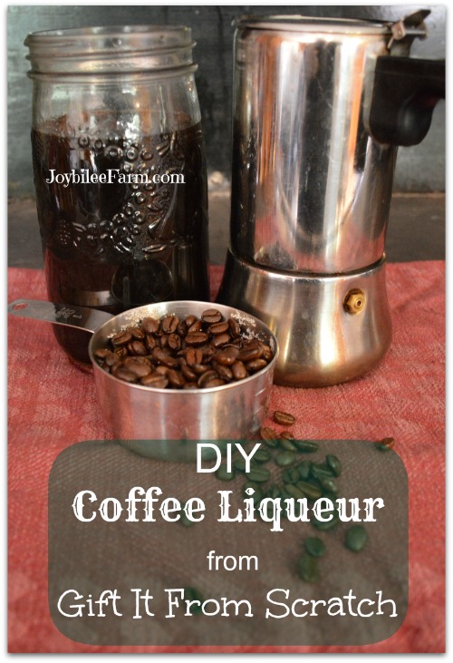 Coffee beans, coffee liqueur in a mason jar and a coffee pot