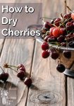 A colander of fresh cherries spilling over