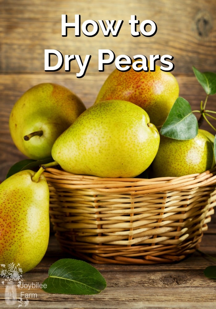 Fresh pears stacked in a wicker bowl
