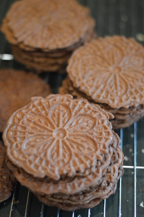 While pizzelles are a traditional Christmas cookie and chocolate mint flavour is traditionally associated with Christmas, these Chocolate Mint Pizzelles are unique and non-traditional. Put your pizzelle iron to work on this easy to make sweet wafer. Then enjoy it with a homemade espresso, mocha, latte, or macchiato.