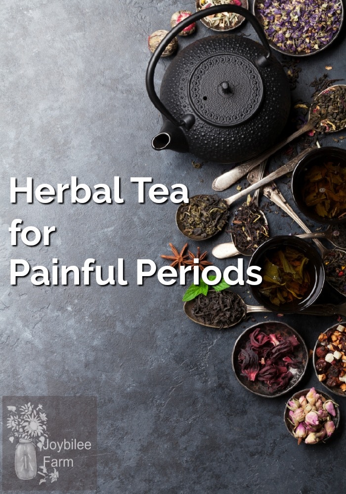 Black tea kettle and bowls of loose leaf teas