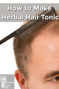 close up of a man combing his thinning hair