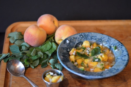 Pink salmon is perfect served with this fresh peach salsa. The juicy fruit and sour-sweet-salty-spicy taste is a perfect complement to the poached fish. Pink salmon has a milder flavour than sockeye or coho salmon, and wears fresh fruit sauces well. How lucky that in BC local peaches and BC wild salmon are in season at the same time!