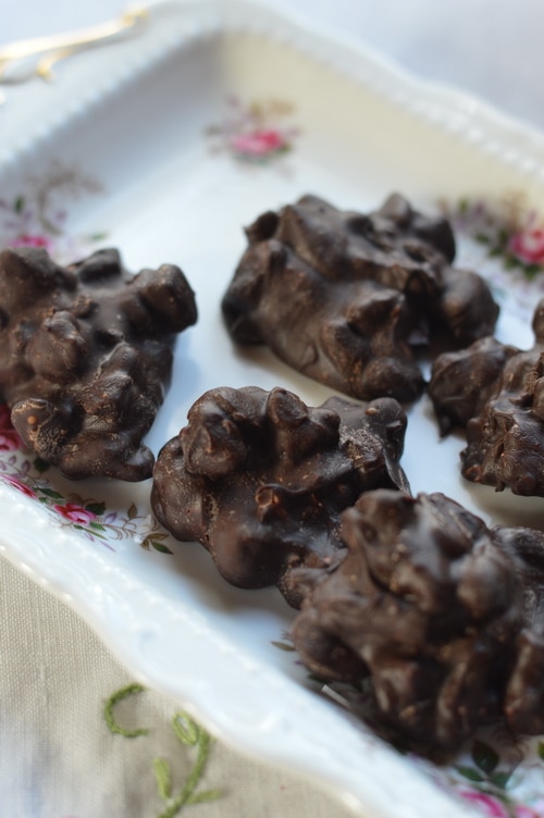 Professionals create chocolates that have snap, sheen, and a smooth mouth feel. Their chocolates don’t have streaks. The texture is crisp rather than crumbly. The secret that professional chocolatiers know that amateurs don’t has to do with tempering the chocolate before you use it.