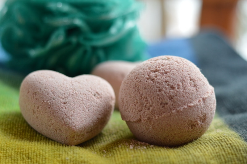 Bath bombs are a fizzy parcel of hydrotherapy in a joyful single serving portion. The dry bath bomb enters the bath tub and immediately erupts in fizzy, foaming delight that is reminiscent of the volcano demonstrations at grade one science fairs. However, the bath bomb is even more wonderful because it explodes with fragrance and herbal goodness, moving a mundane bath into the realm of therapeutic delight. But even though they are wonderful, soothing, and fragrant, the technique necessary to make them at home is difficult to master.