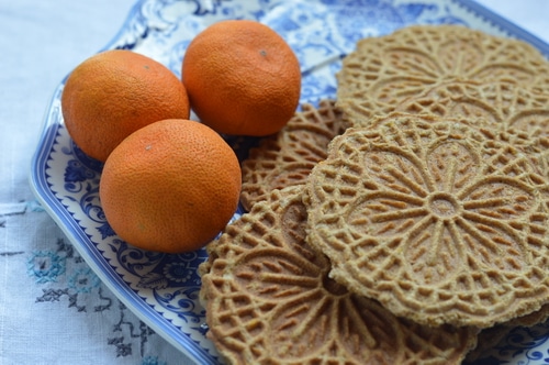 Pizzelles are an Italian wafer cookie made with a special iron press that squishes the cookie batter between two decorative plates, and then heats it to a crisp cookie texture, much like a waffle cone. Pizzelles are quick to make, and not too sweet. Commonly served with espresso they are a light treat that won’t overwhelm.