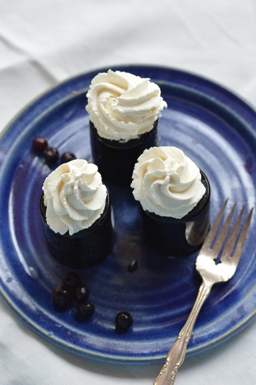 But don’t save this elderberry dessert just for the sick room. Serve this elderberry dessert up often. It’s easy to make, kid pleasing, and pretty enough for company. This recipe uses dried elderberries, but if you have frozen or fresh elderberries or even elderberry juice you can use those instead of making an elderberry decoction. Simply substitute 2 cups of elderberry juice for the dried elderberries and 3 cups of water.