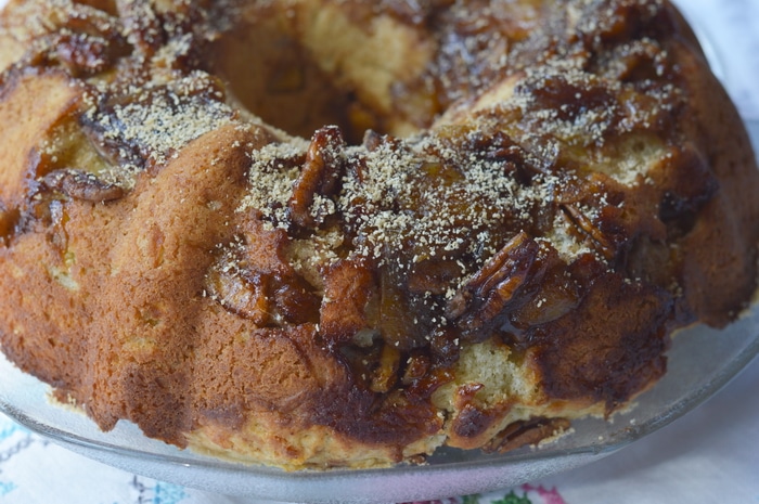 I made up this Maple Apple Bundt Cake to use up the last of our storage of golden delicious apples. If you’ve got apples from last fall’s harvest they will be soft and somewhat shrivelled on the first day of spring. This is the perfect use for those kinds of apples. In fact, my friends were picking the baked apple pieces off the top of the cake while they were waiting for dessert to be served. Win-Win!