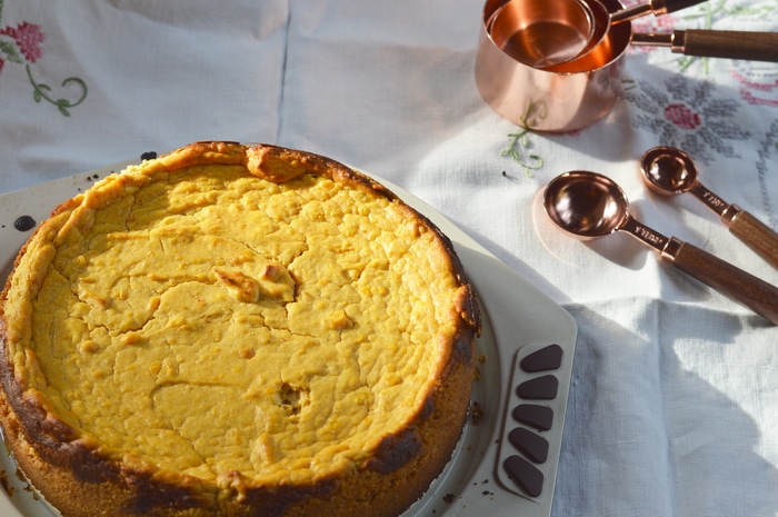 Gluten-free pumpkin cheesecake that can be made ahead for holiday dinners.