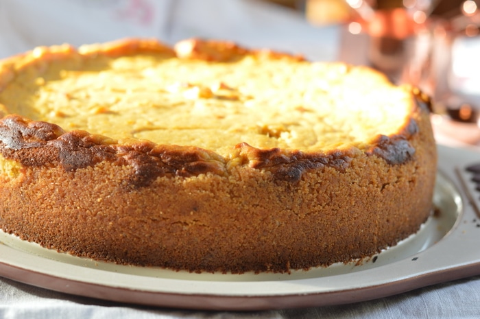 Gluten-free pumpkin cheesecake that can be made ahead for holiday dinners.