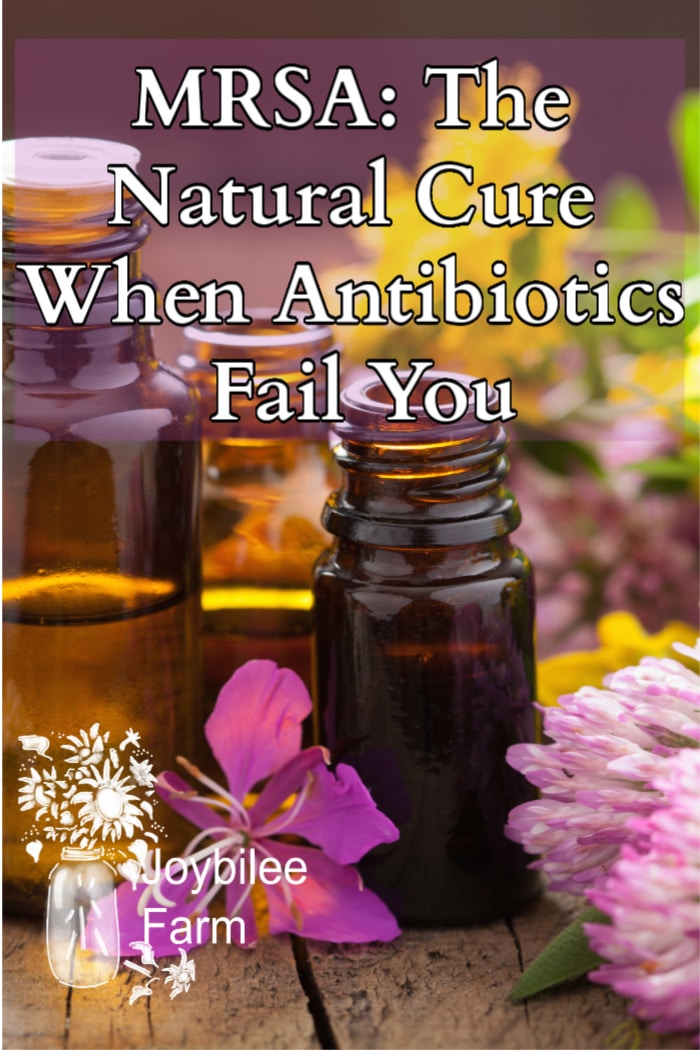 essential oil bottles and herbal flowers