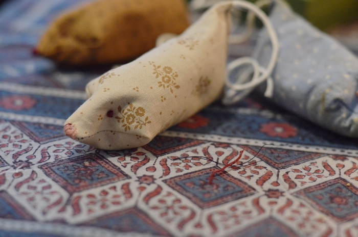 DIY Cat Toys, like this catnip toy mouse for kittens and indoor cats, are easy and quick to make at home with fabric scraps, quilting fabric precuts, and dried catnip from your garden. Cats love these cat toys, too.