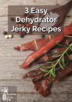 Jerky slices by peppercorns, a sprig of fresh herbs and a spoonful of salt