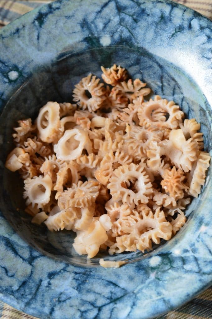sliced morels in a clay bowl