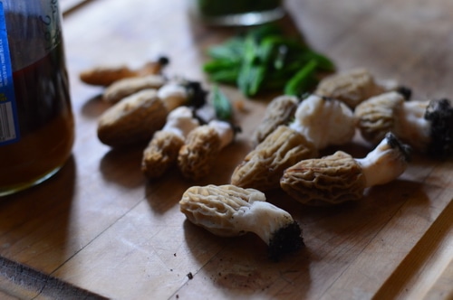 morel mushrooms on a cutting board
