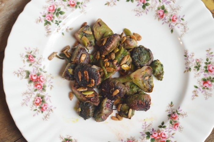 Sunflower buds sauted in butter and garlic and marinaded in fresh lemon juice.
