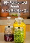 3 Mason jars filled with beautiful green, yellow and red fermenting vegetables.