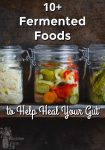 3 Jars of pickled vegetables sitting on a wooden shelf