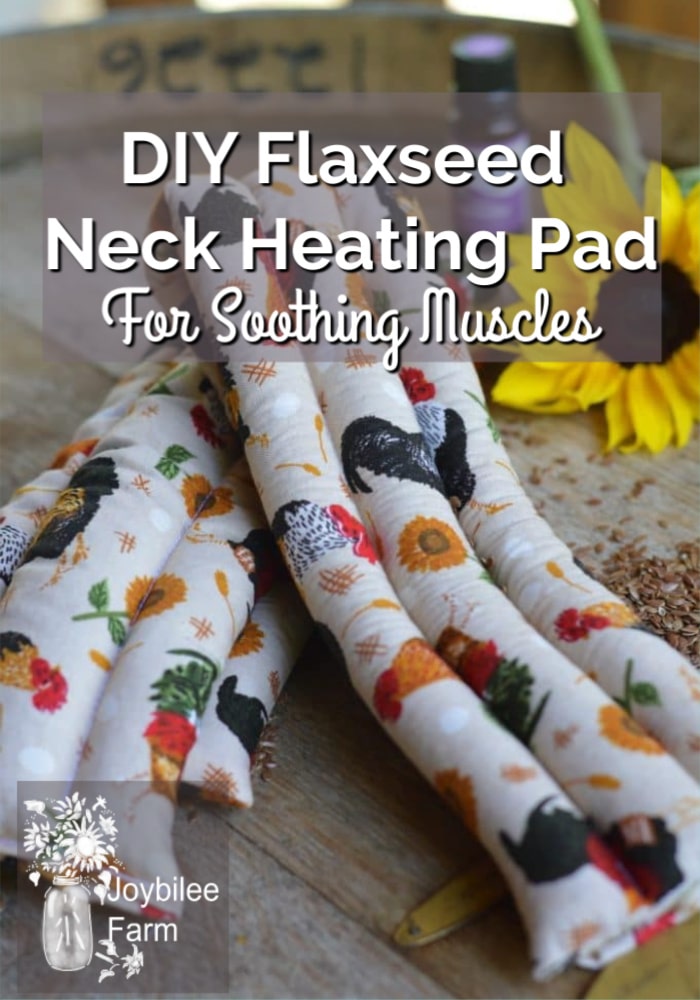 2 homemade neck heating pads on a table with flowers