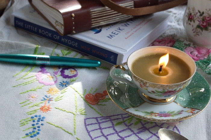 Teacup candle on a table