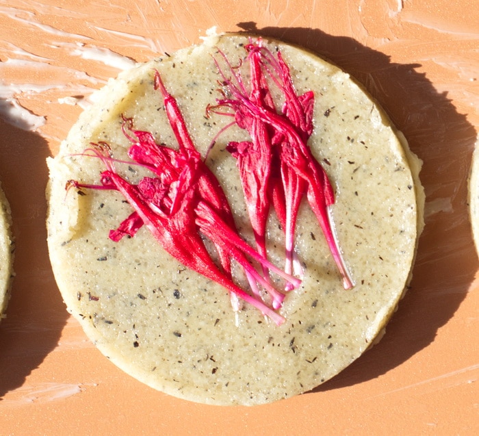 cookie close up, pre baking, with bee balm petals on the cookie