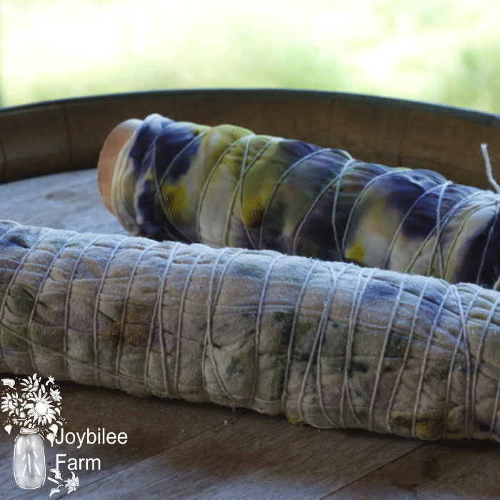 the rolled, leaf print baby blanket