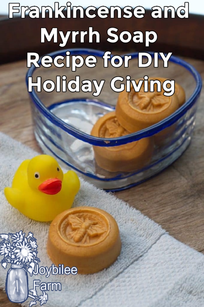 finished frankincense and myrrh soap with a plastic ducky and a towel.