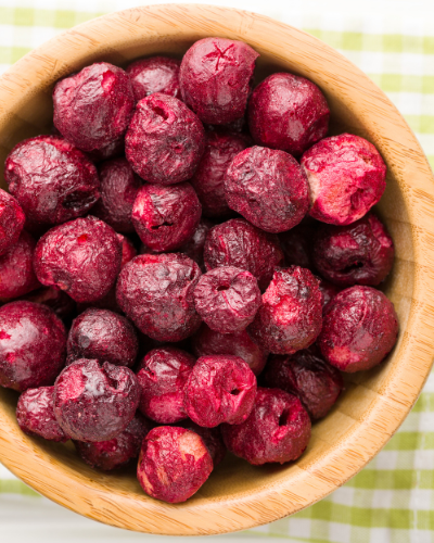 freeze dried cherries in a wooden bowl